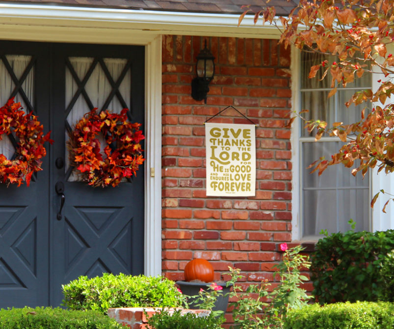 Give Thanks to the Lord fall canvas banner on porch