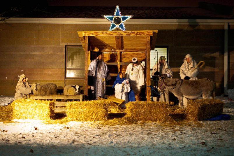 Christmas live nativity display with children